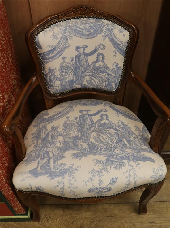 A Louis XV style carved fauteuil
